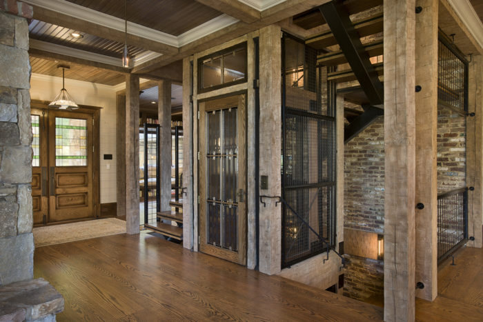 Interior, horizontal, elevator and entry, Bowden residence, Balsam Mountain Preserve, North Carolina; M. Shawn Leatherwood & Associates; Morgan Keefe Builders