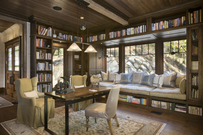 Interior, horizontal, library with window seat looking out windows , Bowden residence, Balsam Mountain Preserve, North Carolina; M. Shawn Leatherwood & Associates; Morgan Keefe Builders