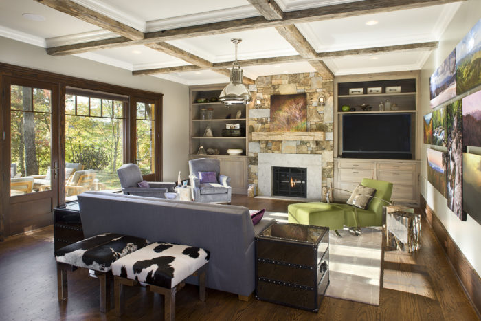 Interior, horizontal, lower level family room toward fireplace, Bowden residence, Balsam Mountain Preserve, North Carolina; M. Shawn Leatherwood & Associates; Morgan Keefe Builders