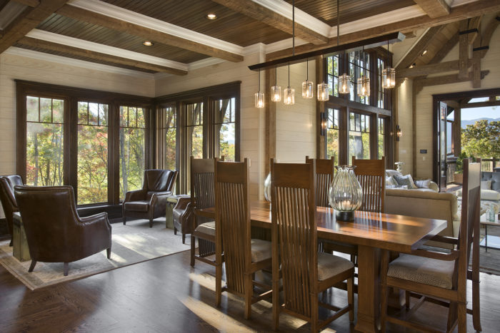 Interior, horizontal, dining and kitchen sitting areas looking into living room, Bowden residence, Balsam Mountain Preserve, North Carolina; M. Shawn Leatherwood & Associates; Morgan Keefe Builders