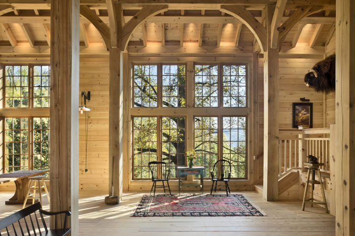 Interior, horizontal, looking out windows to fall color in main art studio, Rupp Art Studio, Waynesville, North Carolina; M. Shawn Leatherwood & Associates; Chuck Davis Construction